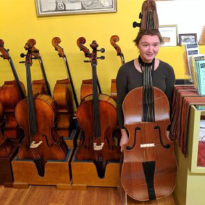 Samantha, Owner posting with Music Instrument in a silly way